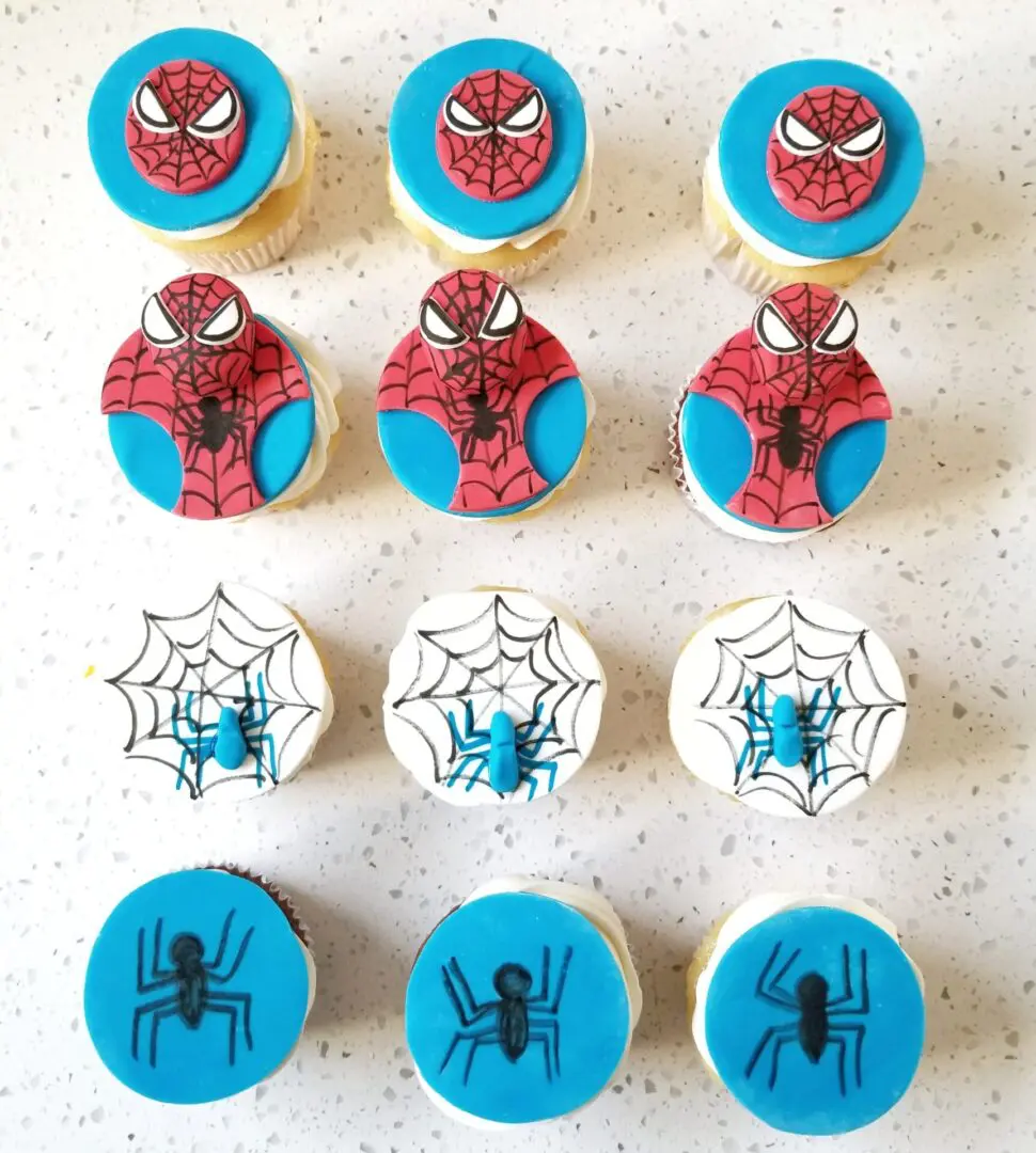 Twelve spiderman topping decorated Cupcakes
