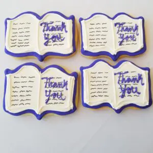Four book shape decorated Cookies