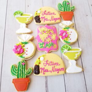 Nine green and pink decorated Cookies