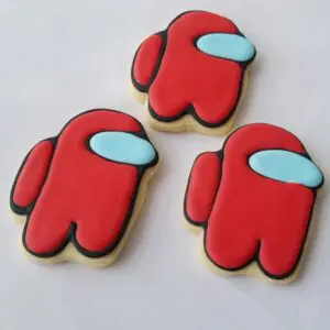 Three red decorated Cookies