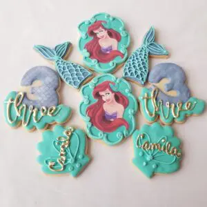 Eight sea green decorated Cookies