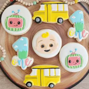 Seven round and car shape decorated Cookies