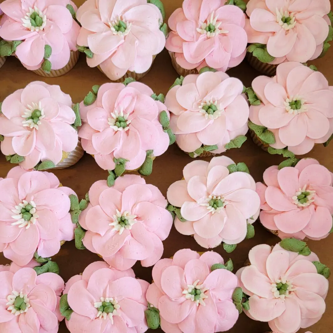 Pink flower topping decorated Cupcakes