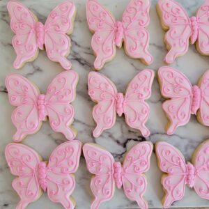 Nine pink butterfly shape decorated Cookies