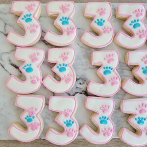 Twelve three shape decorated Cookies