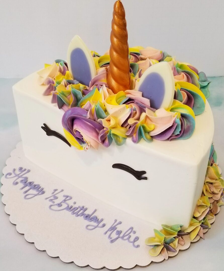 Half cut flowery Girl Birthday Cake