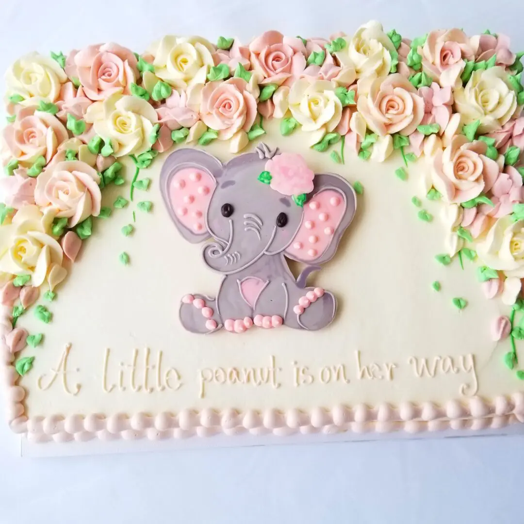 A cake with a baby elephant design