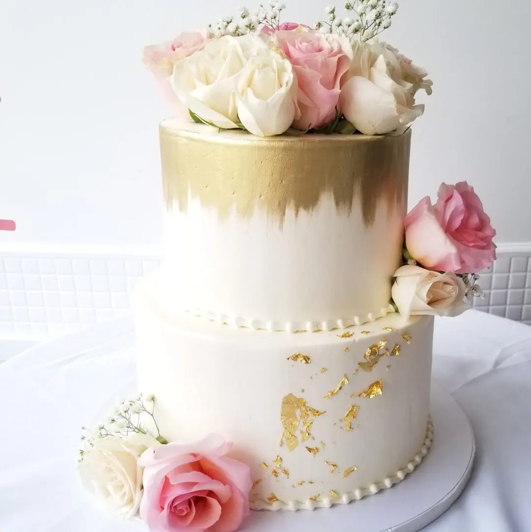 Two tier rose decorated Wedding Cake