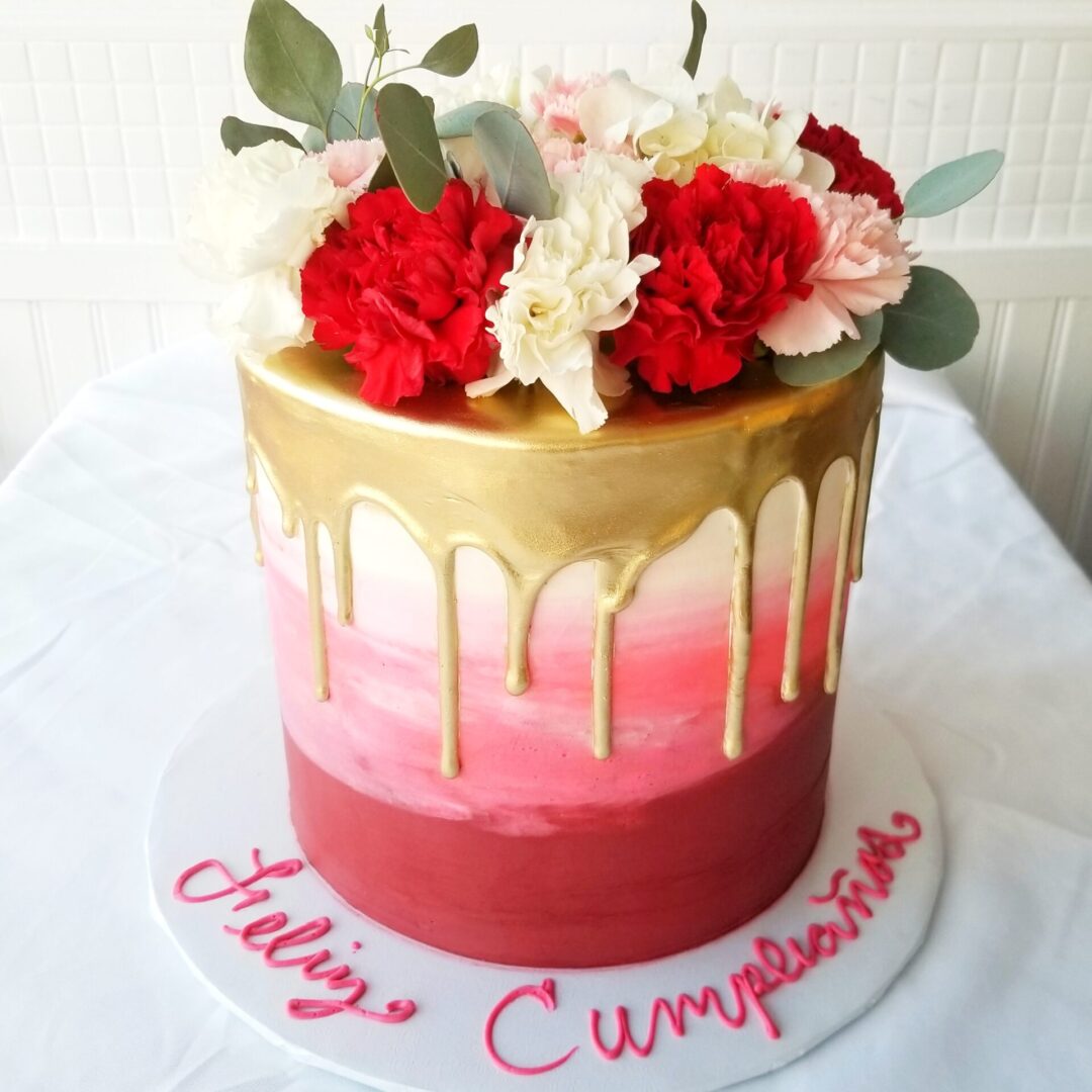Red and white flower decoarated Girl Birthday Cake