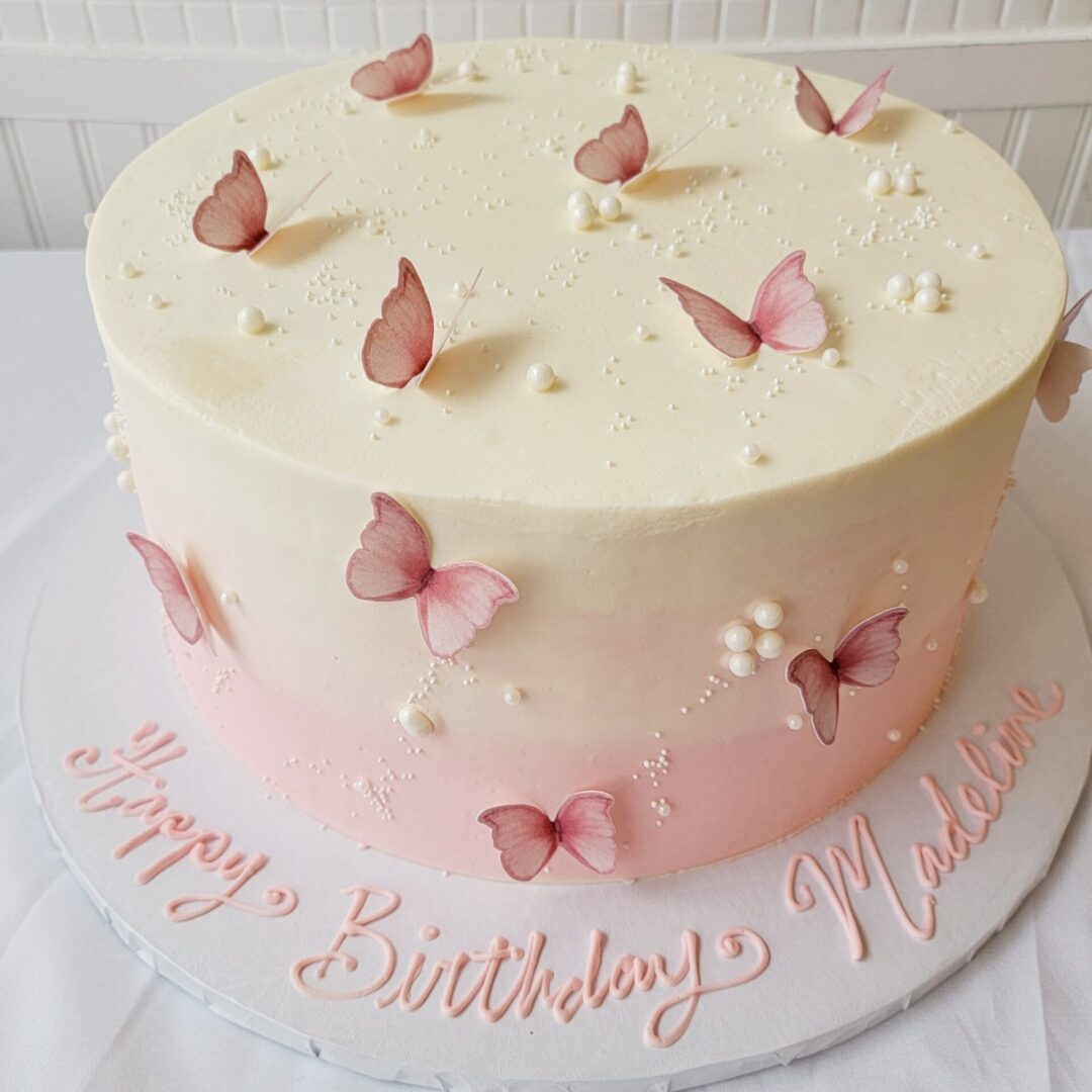 White and pink butterfly decorated Girl Birthday Cake