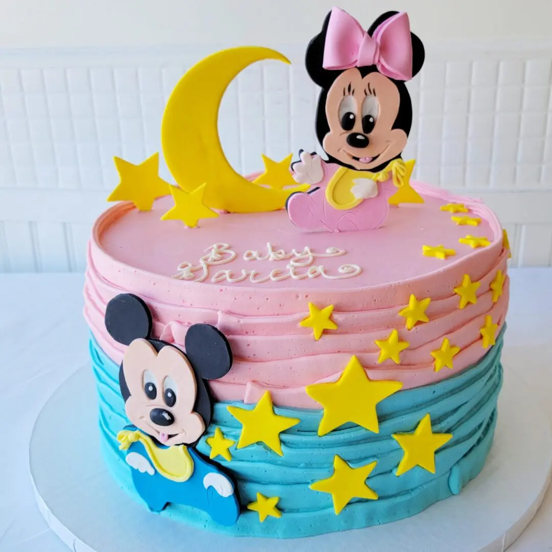 A Mickey and Minnie Mouse cake