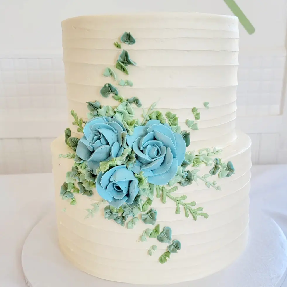 Two tier sea green flower decorated Wedding Cake