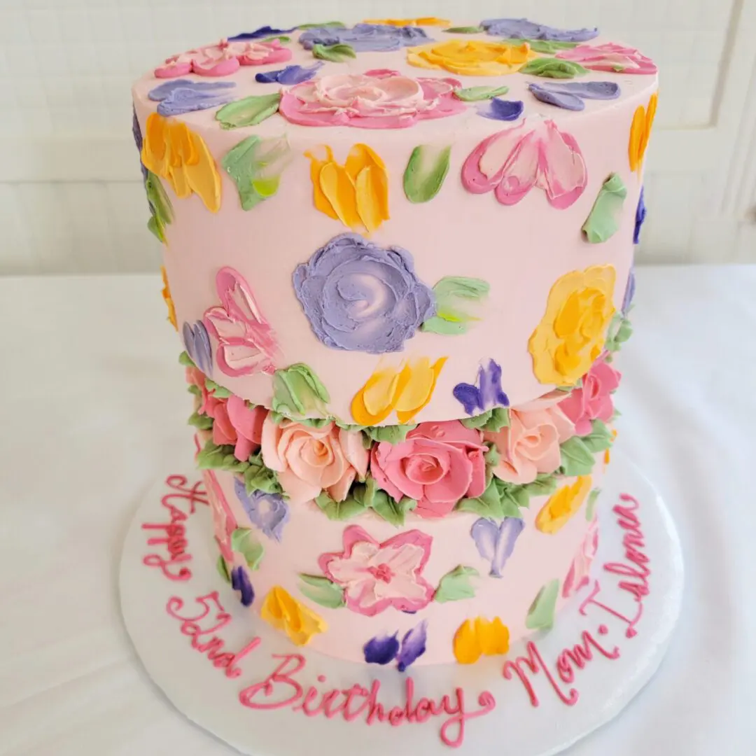 Two tier colorful flower decorated Girl Birthday Cake