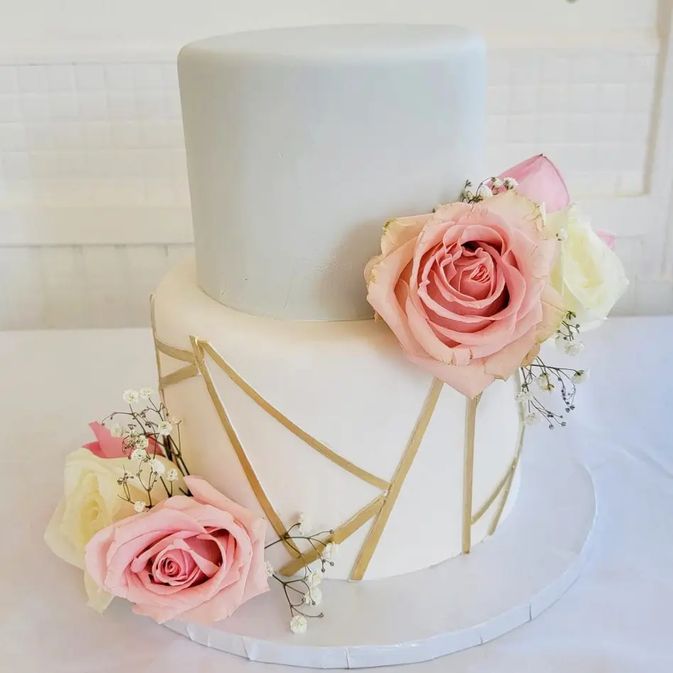 Two tier rose decorated Wedding Cake