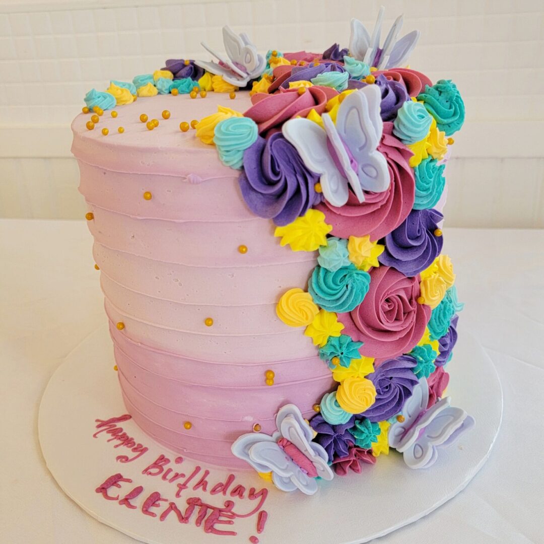 Flower and butterfly decorated Elente Girl Birthday Cake