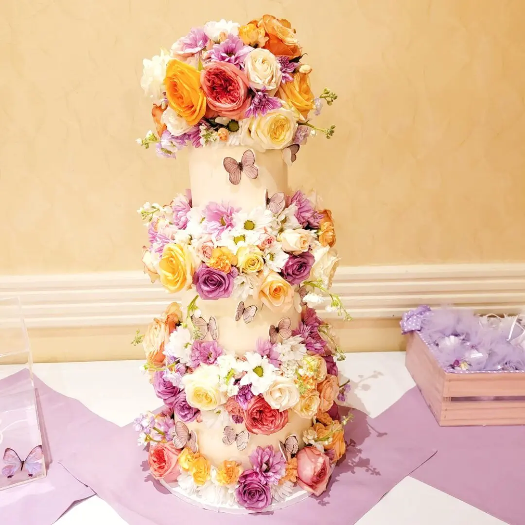Rose and butterfly decorated Wedding Cake
