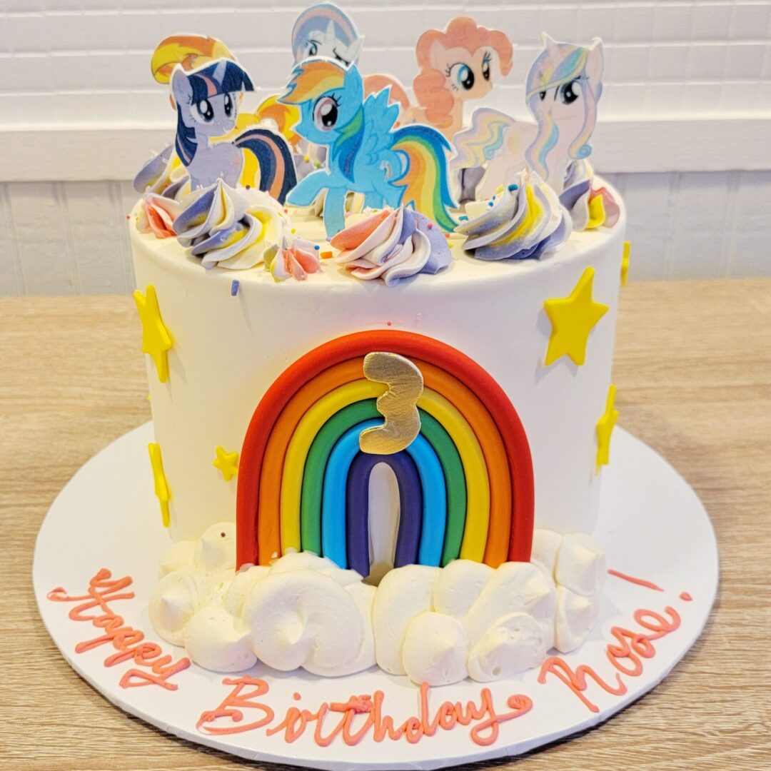 Carton character decorated Girl Birthday Cake