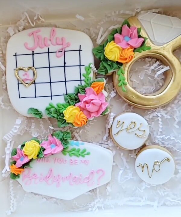 A variety of decorated cookies on display.